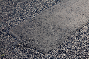 Repaired asphalt pavement road in Ocala, Florida